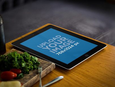 Mockup of an iPad in Portrait Position on a Bistro Table