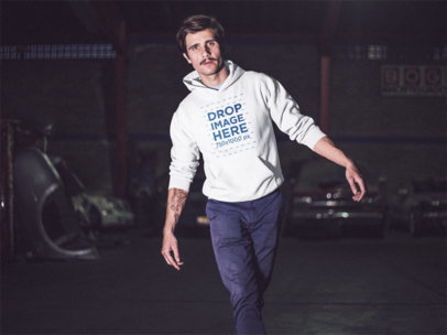 Mockup of a Dude With Tiger Tattoo Walking in the Night While Wearing a Pullover Hoodie in the City  a13617