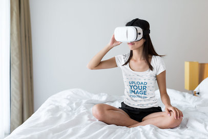 T-Shirt Mockup of a Woman Using a VR Headset in Her Bedroom 42775-r-el2