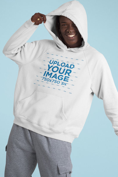 Mockup of a Playful Man Wearing a Pullover Hoodie