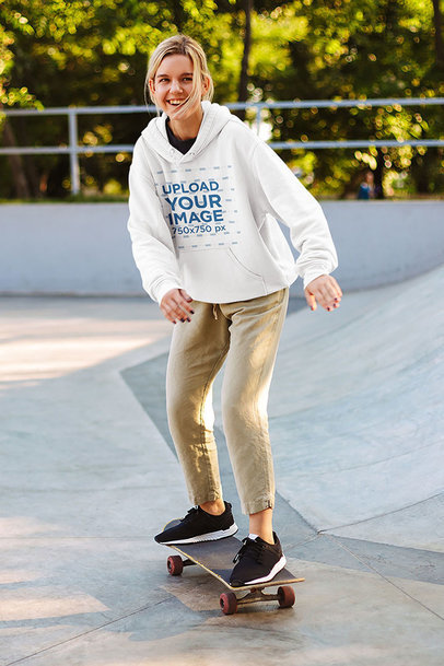 Hoodie Mockup of a Young Woman at a Skatepark