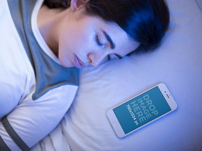 Young White Girl Sleeping with Her White IPhone 6 Besides Her Mockup 14080a