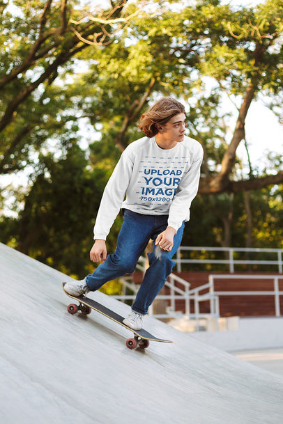 Sweatshirt Mockup of a Young Man Riding a Skateboard