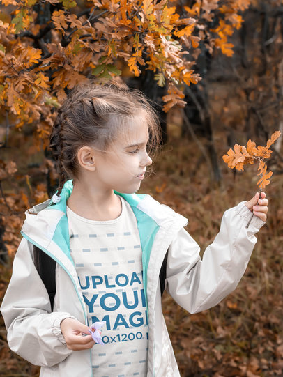 T-Shirt Mockup Featuring a Girl Holding Autumn Leaves 42461-r-el2