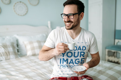 V-Neck Tee Mockup of a Man Having an Espresso at Home