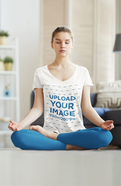 Mockup of a Woman in a Deep V-Neck T-Shirt Meditating at Home