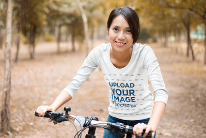 3/4 Sleeve Tee Mockup of a Happy Woman Riding a Bike 42464-r-el2