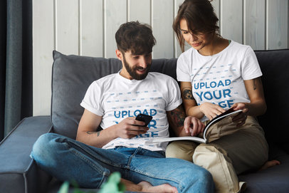 T-Shirt Mockup Featuring a Couple Sitting Together