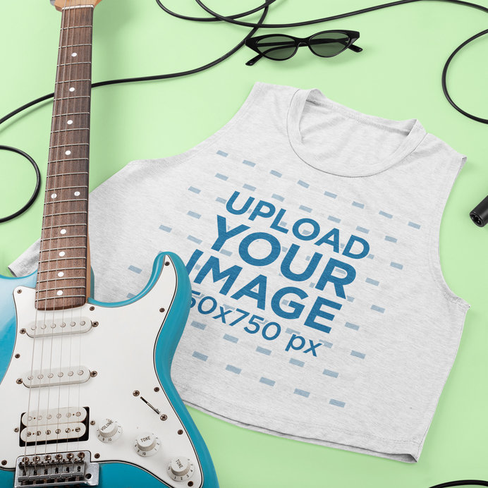 Mockup of a Heathered Sleeveless Crop Top Featuring a Guitar