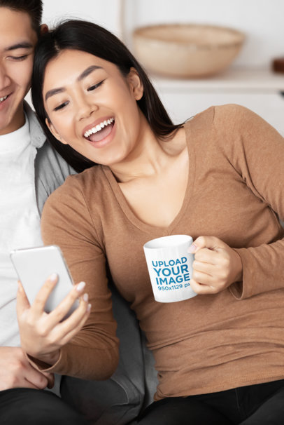 Mockup of a Happy Woman Holding an 11 oz Coffee Mug