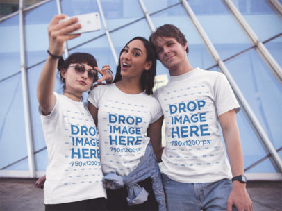 Two Women and One Guy Wearing Same T-Shirts Taking a Selfie While Hanging out in the City