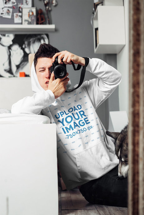 Pullover Hoodie Mockup of a Man Taking a Mirror Selfie