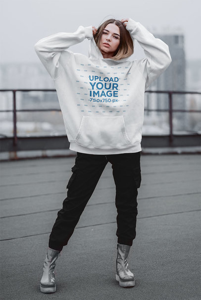 Mockup Featuring a Woman Posing with an Oversize Hoodie 41338-r-el2