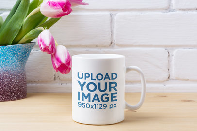 11 oz Coffee Mug Mockup Featuring Some Pink Flowers