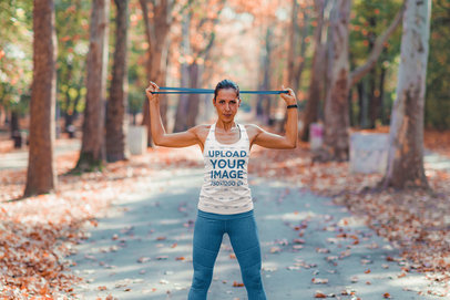 Mockup of a Woman with a Sublimated Tank Top Training in a Park