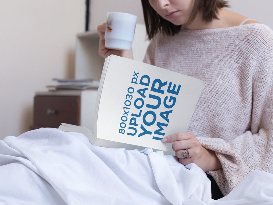Young Woman Reading a Book While Drinking a Tea in Her Bed Mockup