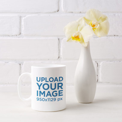 Mockup of an 11 oz Mug Next to a Flower Vase