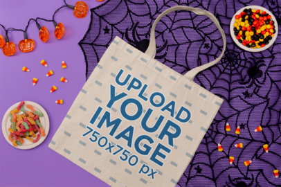 Mockup of a Flat Laid Tote Bag Featuring Halloween Candy m111