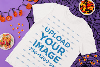 Mockup of a Flat Laid T-Shirt with Halloween Items