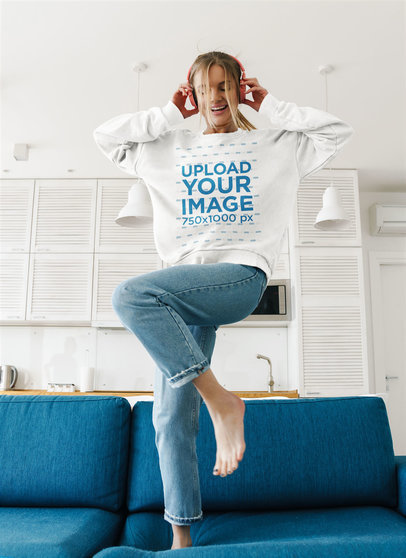 Mockup of a Woman With a Crewneck Sweatshirt Dancing With Headphones on 