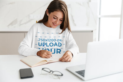 Sweatshirt Mockup Featuring a Smiling Woman Working From Home
