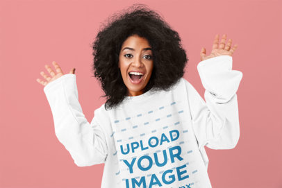 Mockup of a Woman Wearing an Oversized Sweatshirt in a Studio