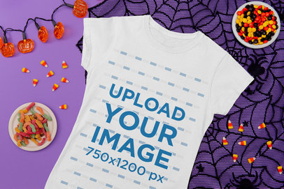 Mockup of a Women's Tee on a Halloween-Decorated Surface