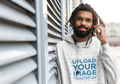 Pullover Hoodie Mockup of a Bearded Man in an Urban Setting