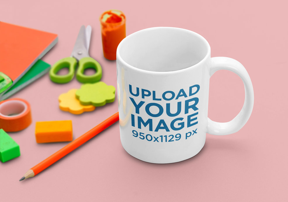 11 oz Mug Mockup Featuring Some Stationery Items 
