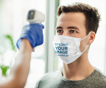 Face Mask Mockup Featuring a Serious Man 