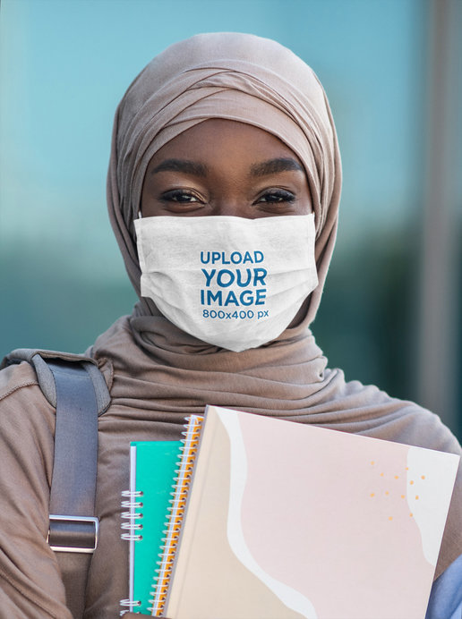 Face Mask Mockup Featuring a Happy Young Student