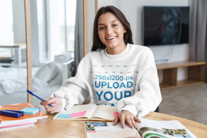Sweatshirt Mockup Featuring a Young Happy Woman Studying at Home 40484-r-el2