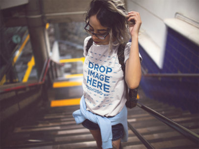 Template of a Hispanic Woman Playing With Her Hair Wearing a Round Neck Tshirt While in Some Stairways
