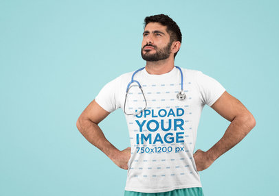 T-Shirt Mockup Featuring a Male Nurse Doing a Power Pose 