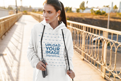 Pullover Hoodie Mockup Featuring a Woman Holding a Jumping Rope 