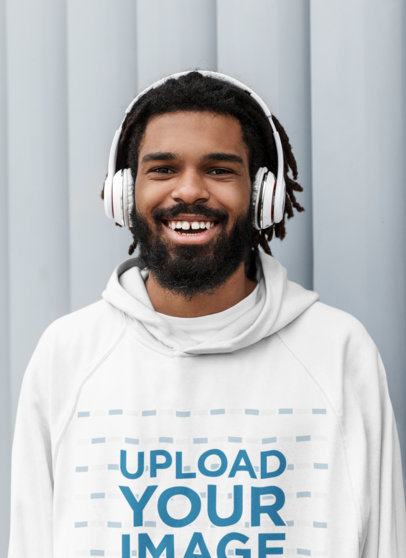 Hoodie Mockup of a Happy Bearded Man Wearing Headphones