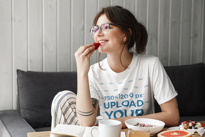 T-Shirt Mockup of a Woman Eating Strawberries for Breakfast