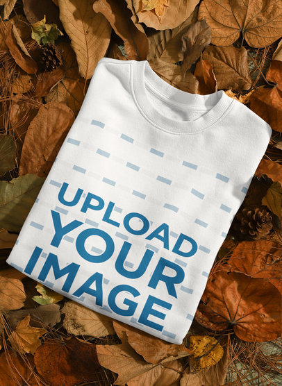 Mockup Featuring a Sweatshirt  Placed on Autumn Leaves 