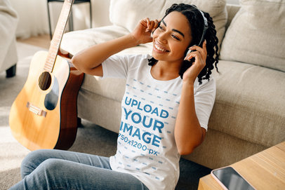 T-Shirt Mockup Featuring a Female Musician at Home