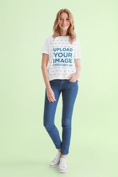 T-Shirt Mockup of a Woman Casually Standing in a Studio