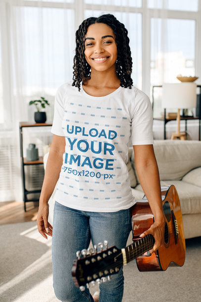 T-Shirt Mockup Featuring a Young Woman Holding a Guitar