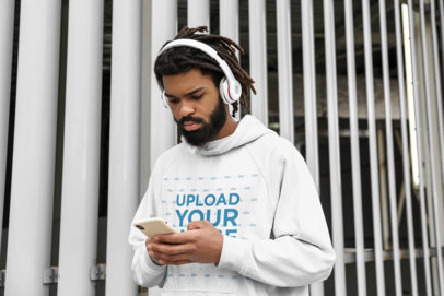 Hoodie Mockup of a Bearded Man Listening to Music on His Phone 42623-r-el2