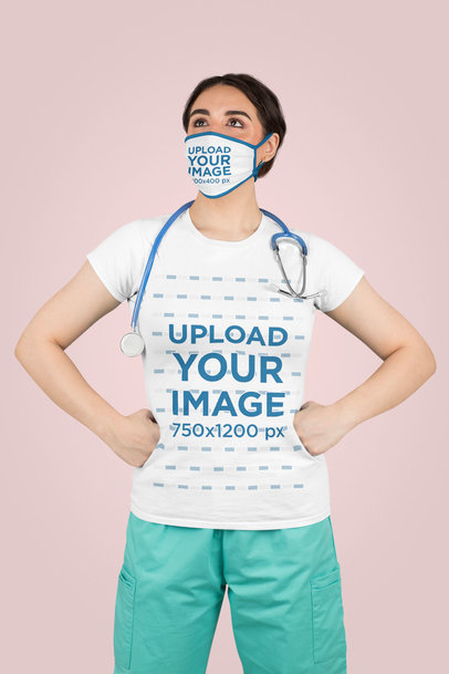 T-Shirt Mockup Featuring a Nurse With a Face Mask Posing With Her Hands on Her Hips