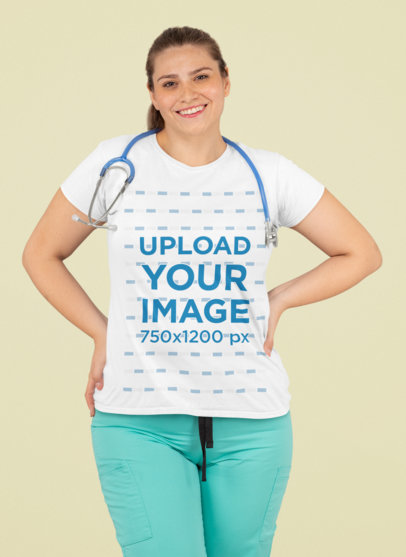 T-Shirt Mockup of a Medical Worker Happily Posing in a Studio