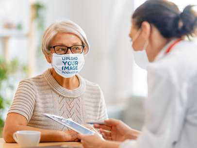 Face Mask Mockup of a Senior Woman Talking to the Doctor