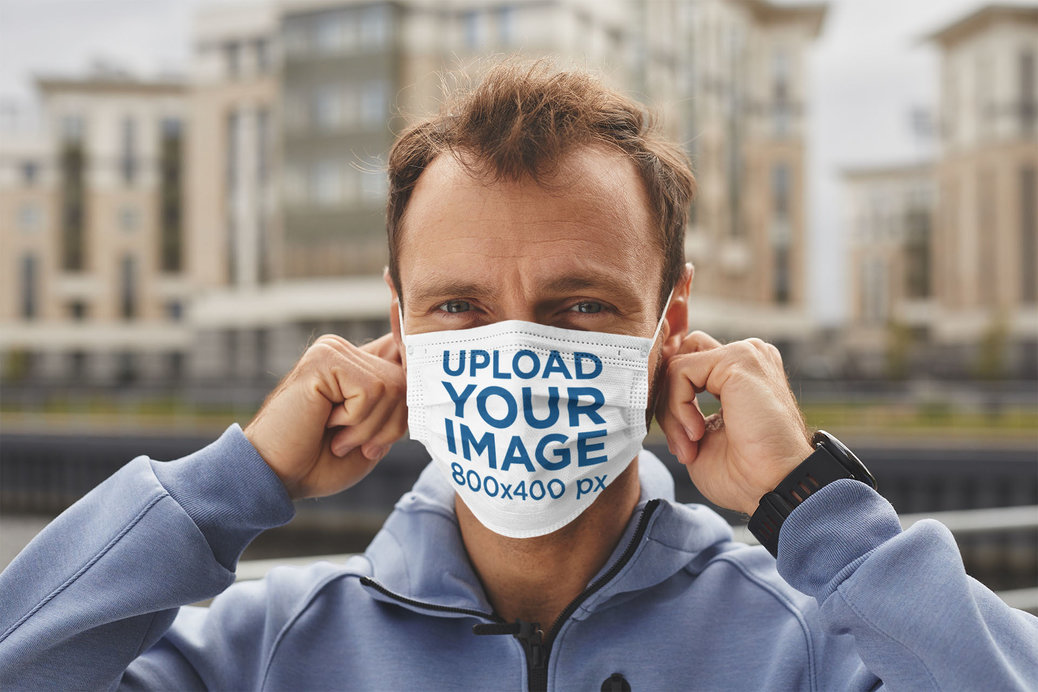 Face Mask Mockup Featuring a Middle-Aged Man in the City