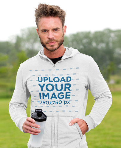 Mockup of a Bearded Athlete Posing with a Hoodie at a Park 40185-r-el2