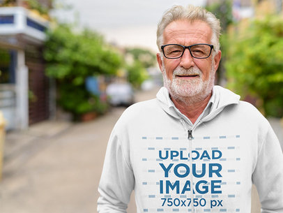 Mockup of a Senior Man Wearing a Full-Zip Hoodie on the Street