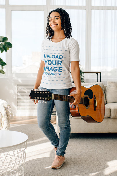 T-Shirt Mockup Featuring a Young Woman Holding an Acoustic Guitar