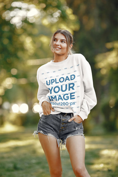 Sweatshirt Mockup of a Happy Woman Posing With Her Hands in Her Pockets